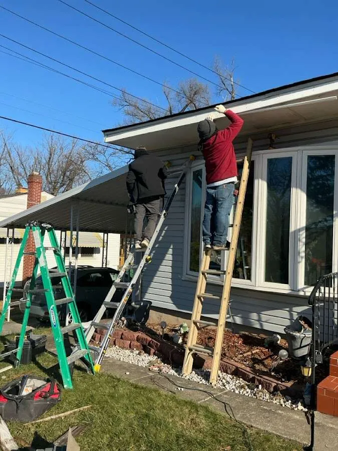 Restoration crew performing exterior repair in Wixom